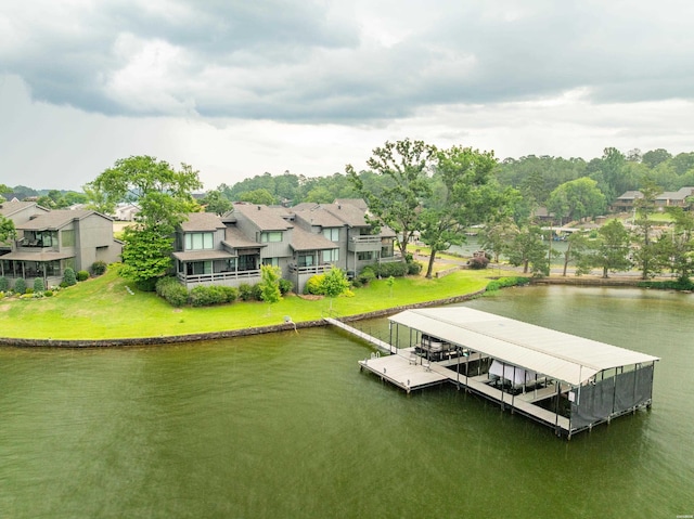 105 Long Island Bay Unit A1, Hot Springs, AR 71913 - dock area featuring a water view, boat lift, a residential view, and a yard