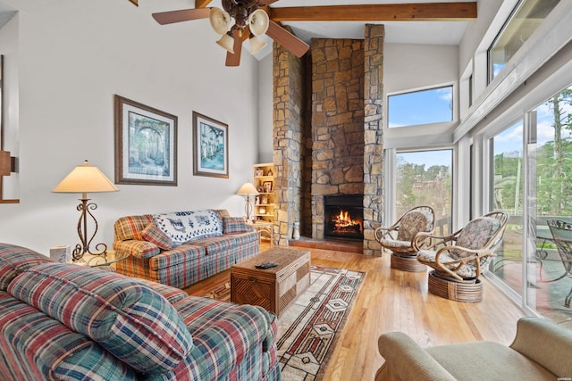 105 Long Island Bay Unit A1, Hot Springs, AR 71913 - living area featuring high vaulted ceiling, a ceiling fan, wood-type flooring, beam ceiling, and a fireplace