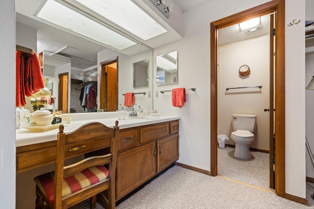 105 Long Island Bay Unit A1, Hot Springs, AR 71913 - bathroom featuring double vanity and a spacious closet