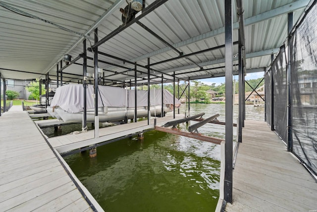 105 Long Island Bay Unit A1, Hot Springs, AR 71913 - dock area featuring boat lift and a water view
