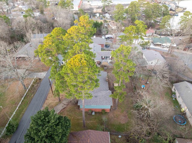 birds eye view of property with a residential view