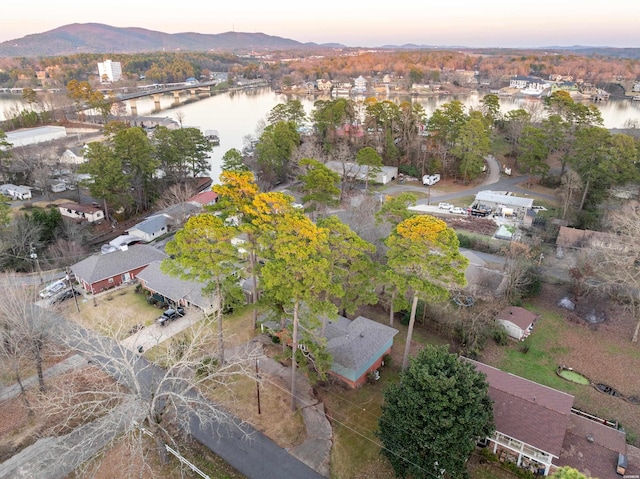 bird's eye view with a water and mountain view