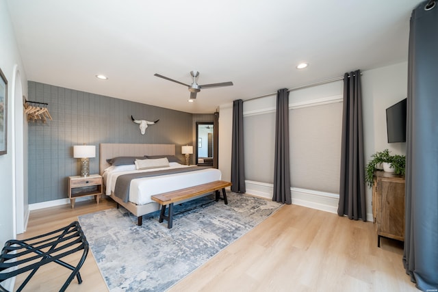 bedroom with a ceiling fan, recessed lighting, baseboards, and light wood finished floors