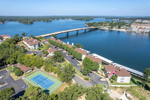 drone / aerial view with a residential view and a water view