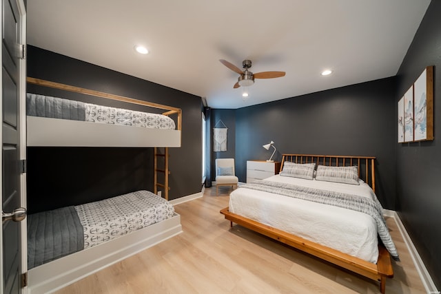 bedroom with light wood-style flooring, baseboards, a ceiling fan, and recessed lighting