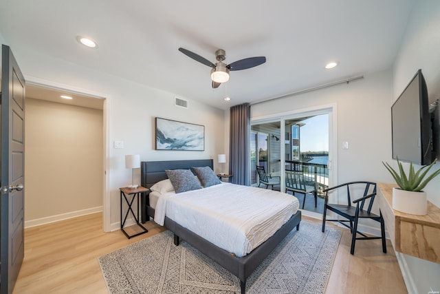 bedroom with access to outside, light wood-type flooring, visible vents, and recessed lighting