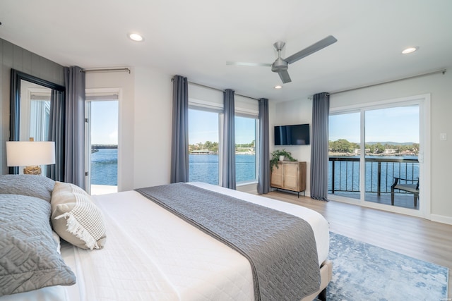 bedroom featuring a ceiling fan, access to outside, light wood finished floors, and recessed lighting