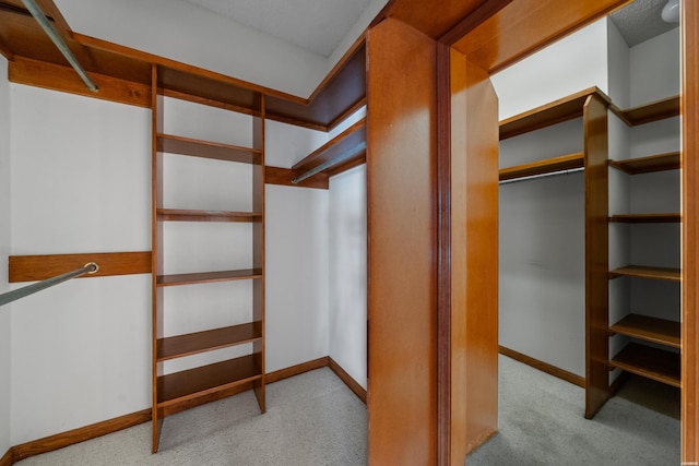 69 Resplandor Way, Hot Springs Village, AR 71909 - walk in closet featuring carpet flooring