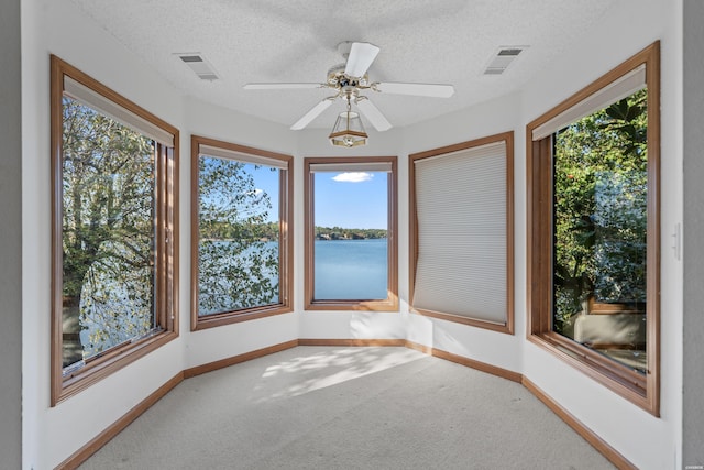 69 Resplandor Way, Hot Springs Village, AR 71909 - interior space featuring carpet floors, visible vents, and a wealth of natural light
