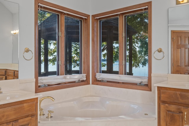 69 Resplandor Way, Hot Springs Village, AR 71909 - bathroom with a bath, a sink, and two vanities