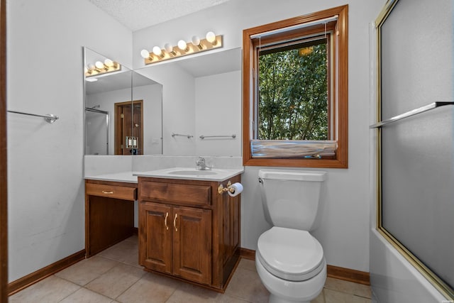69 Resplandor Way, Hot Springs Village, AR 71909 - full bathroom with a textured ceiling, toilet, baseboards, tile patterned flooring, and vanity