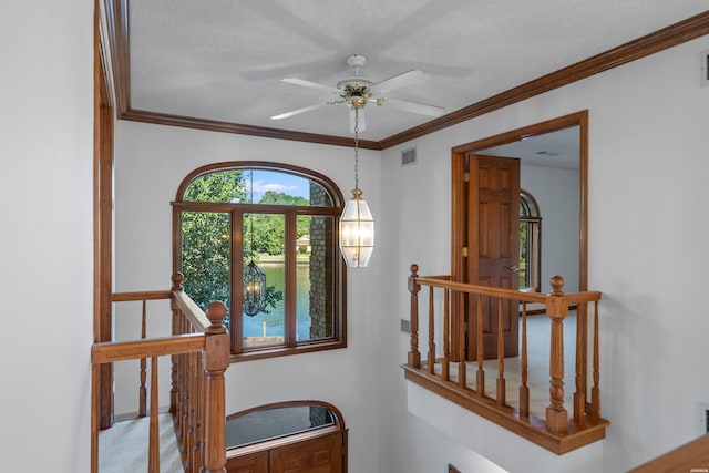 69 Resplandor Way, Hot Springs Village, AR 71909 - interior space with ceiling fan, ornamental molding, a textured ceiling, and visible vents