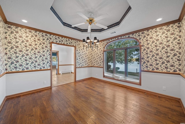 69 Resplandor Way, Hot Springs Village, AR 71909 - spare room with wallpapered walls, hardwood / wood-style flooring, a tray ceiling, and ornamental molding