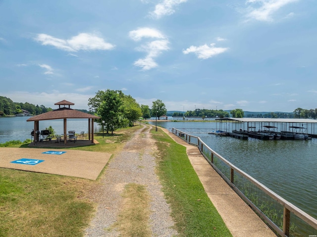 exterior space with a floating dock and a gazebo