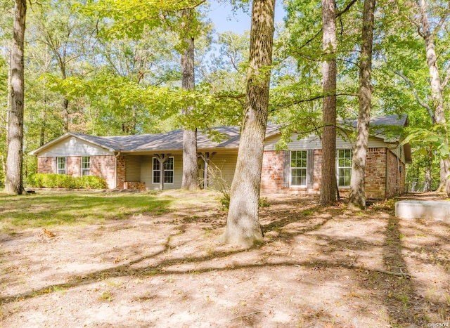 ranch-style home with brick siding