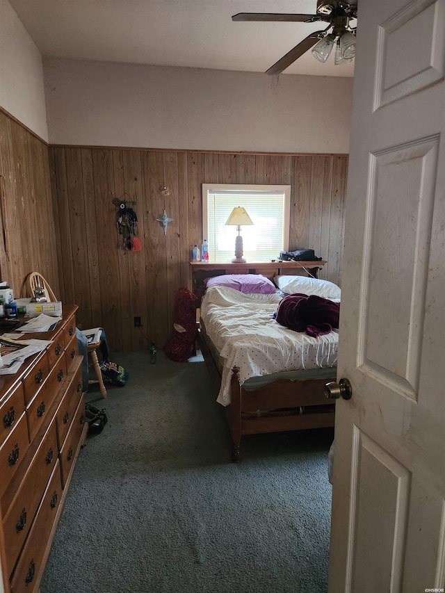 256 Shawnee Loop, Amity, AR 71921 - carpeted bedroom with wooden walls and ceiling fan