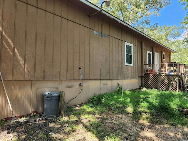 256 Shawnee Loop, Amity, AR 71921 - view of side of home featuring crawl space and a deck