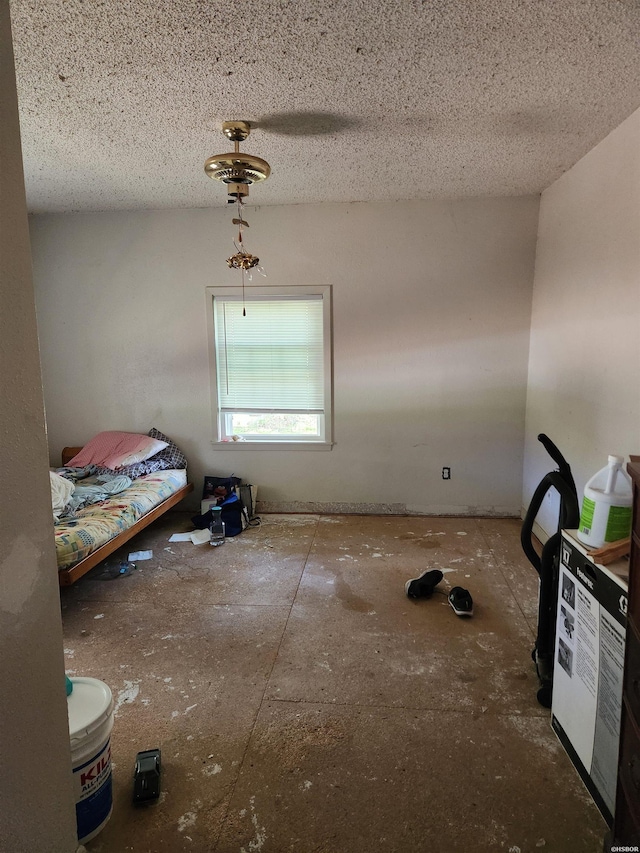 256 Shawnee Loop, Amity, AR 71921 - bedroom with a textured ceiling