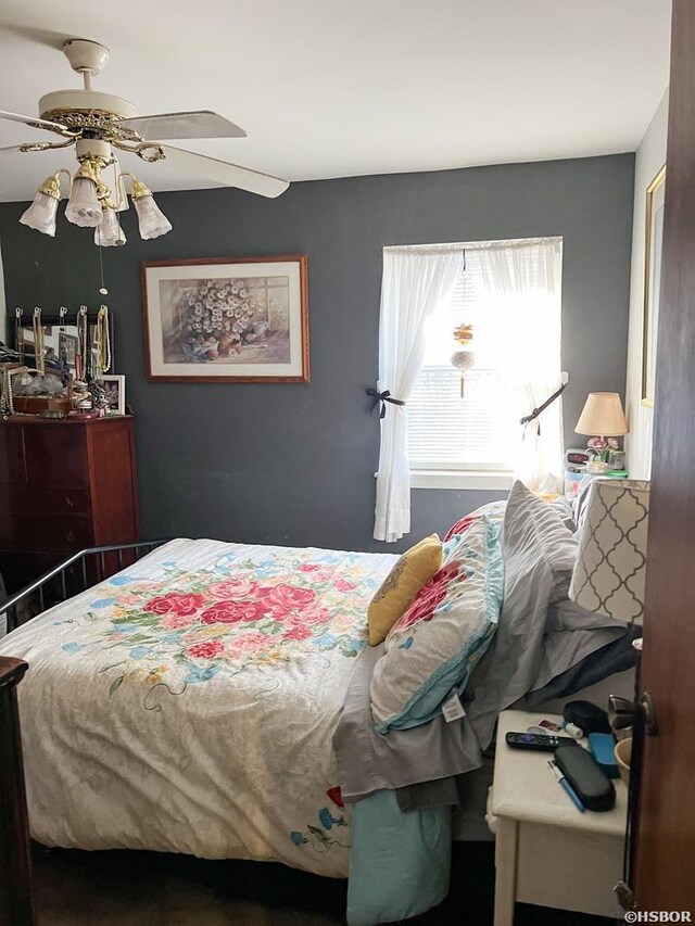 bedroom featuring ceiling fan