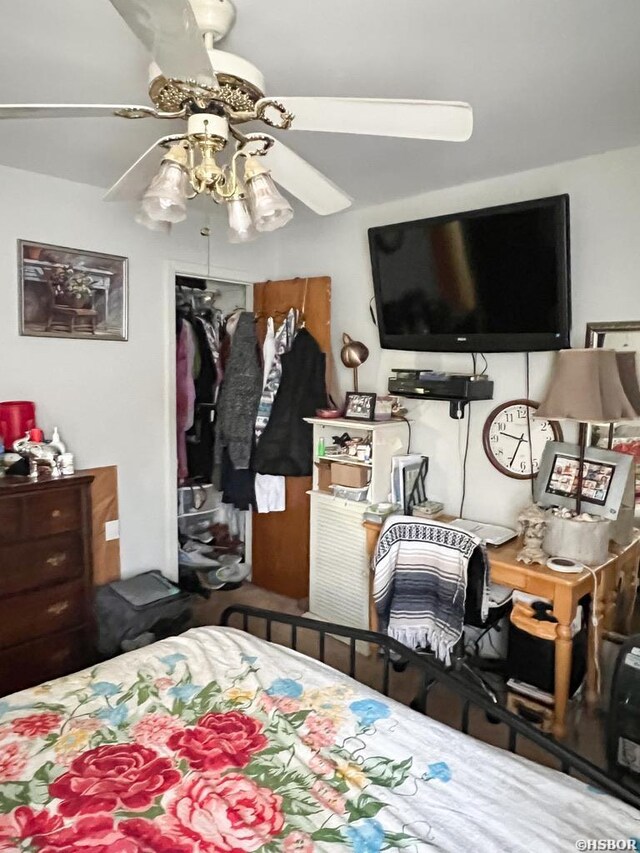 bedroom featuring a closet and ceiling fan