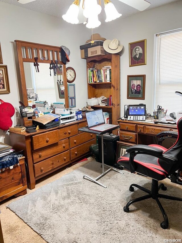 office space with a textured ceiling