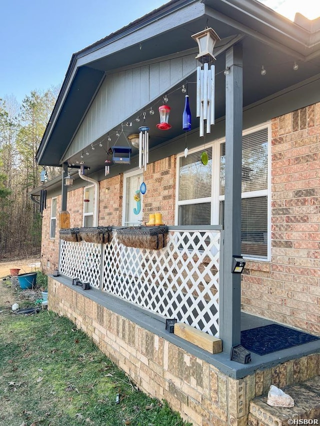 view of home's exterior with brick siding