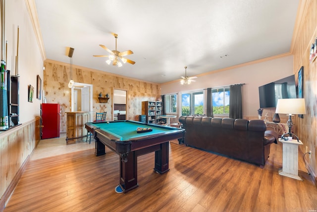 recreation room with ceiling fan, pool table, wood finished floors, and crown molding