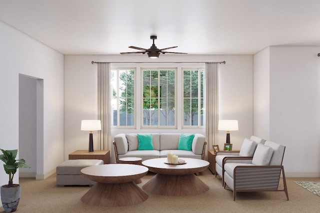 living area featuring ceiling fan and light colored carpet