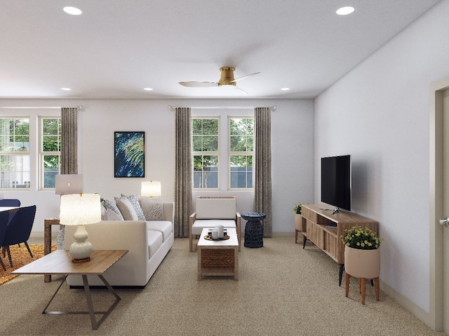 living room with light carpet, plenty of natural light, and ceiling fan