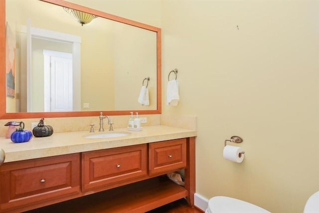 half bath with toilet and vanity