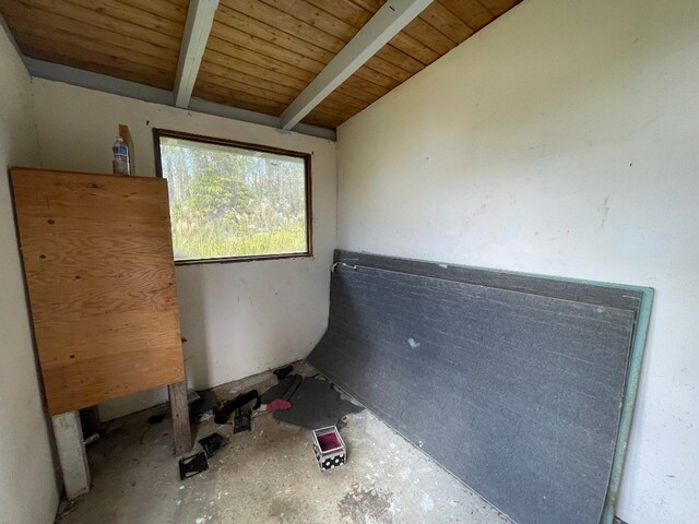 miscellaneous room with wood ceiling and vaulted ceiling with beams