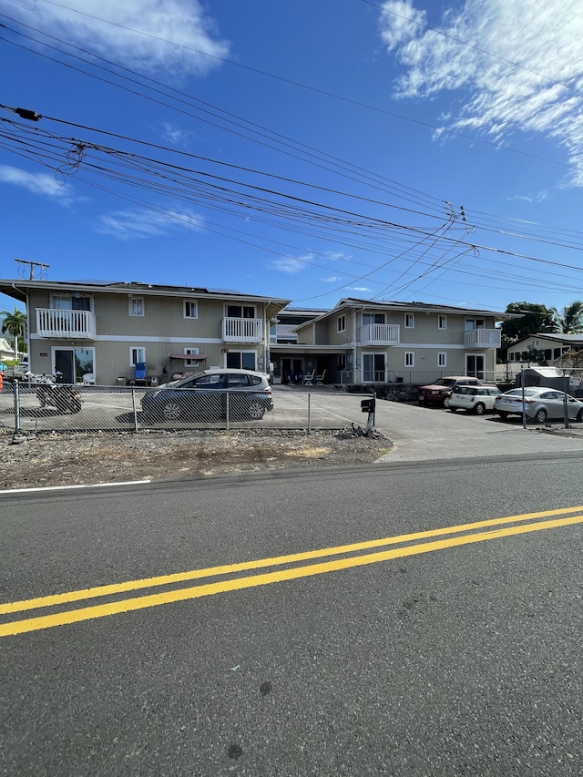 view of front facade with a fenced front yard