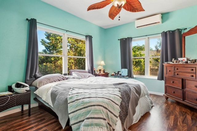 bedroom featuring ceiling fan, dark wood-type flooring, and a wall mounted air conditioner