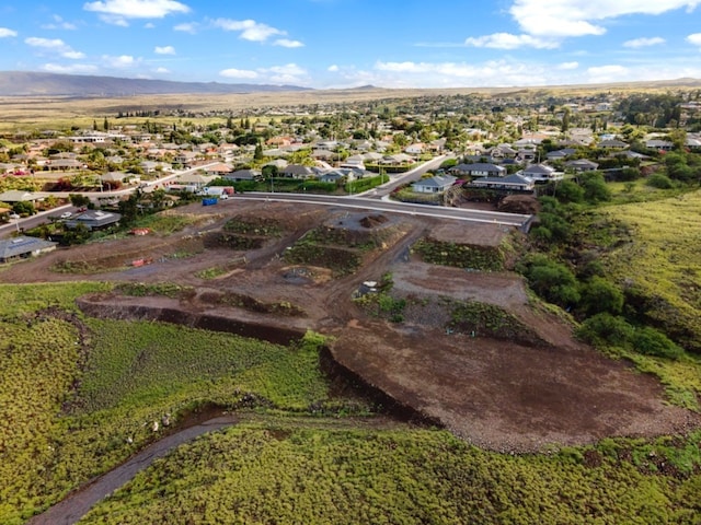 drone / aerial view featuring a mountain view