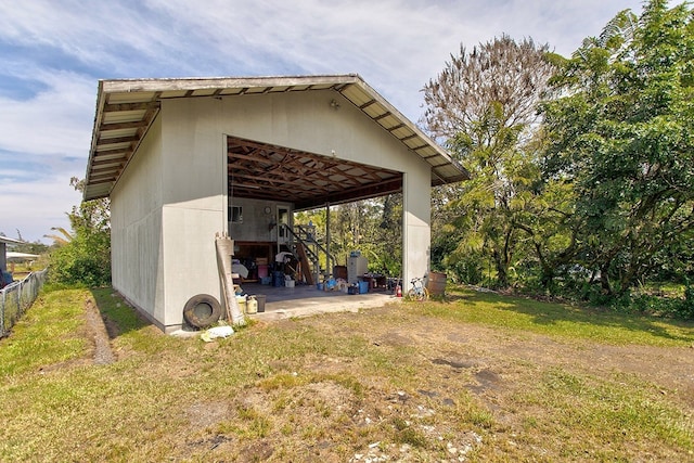 view of outdoor structure with a yard