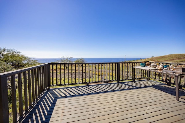 wooden terrace with a water view