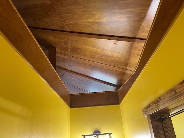 room details with wood ceiling and wood walls