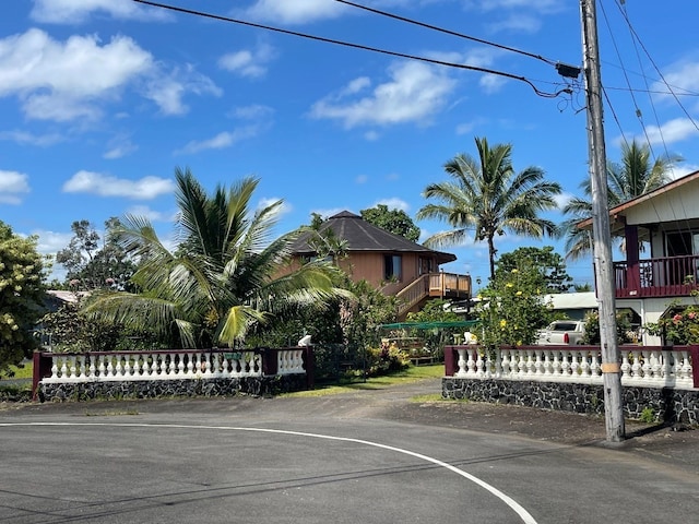 view of front of home with a balcony