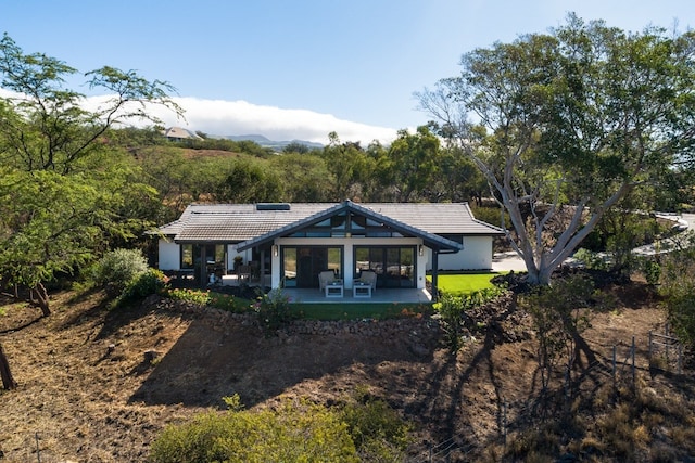 view of front of house with a patio