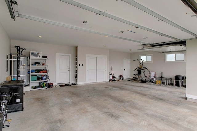 garage featuring strapped water heater