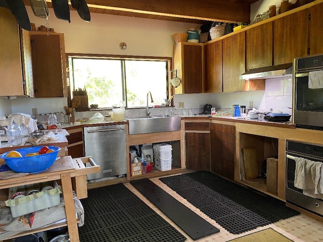 kitchen featuring appliances with stainless steel finishes and sink