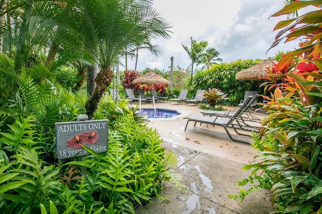 view of patio featuring a pool