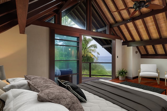 bedroom with lofted ceiling with beams, wood ceiling, and multiple windows