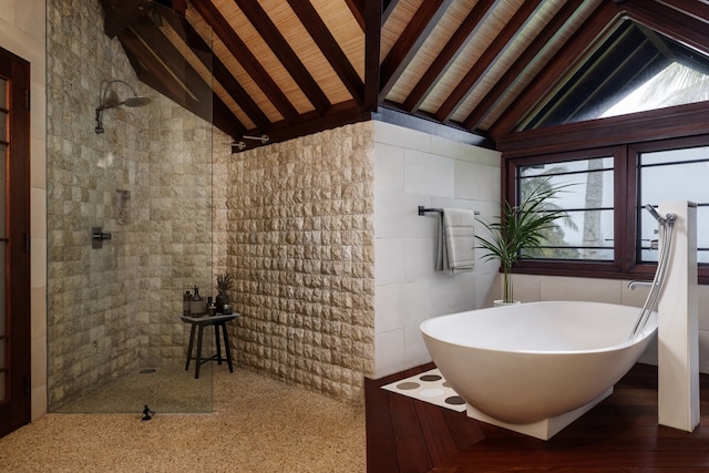 bathroom with high vaulted ceiling, wood ceiling, separate shower and tub, and beam ceiling