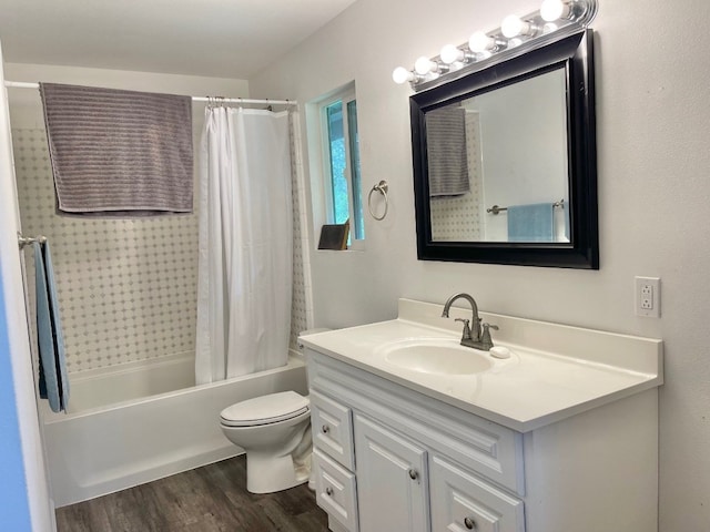 full bathroom with shower / bath combo with shower curtain, wood-type flooring, toilet, and vanity