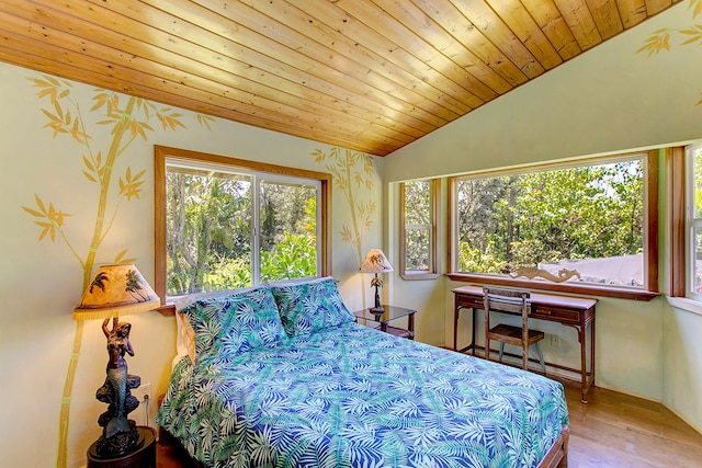 bedroom with wooden ceiling, light wood-type flooring, and vaulted ceiling