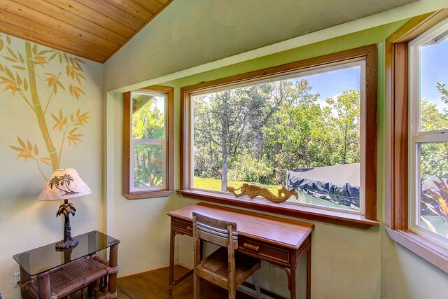 dining space with wood ceiling, vaulted ceiling, and wood-type flooring