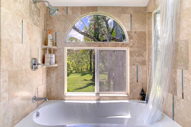 bathroom with tile walls