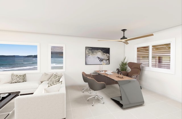 office area featuring ceiling fan, light tile flooring, and a water view