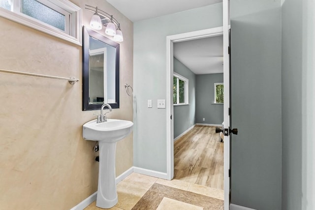 bathroom featuring hardwood / wood-style flooring